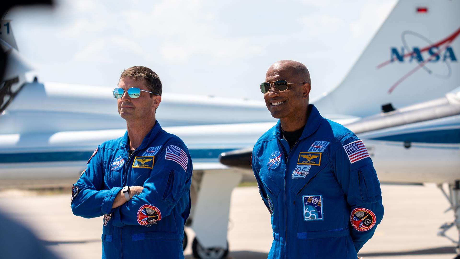 These images show the moments shortly after the arrival of the Artemis II crew to NASA’s Kennedy Space Center on March 27, 2026 ahead of the launch. The four astronauts, Victor Glover, Reid Wiseman, Christina Koch, and Jeremy Hansen, arrived on a T38, which can be seen behind them. They took turns speaking to the crowd as they also announced the zero-gravity indicator they would be taking with them on their journey.